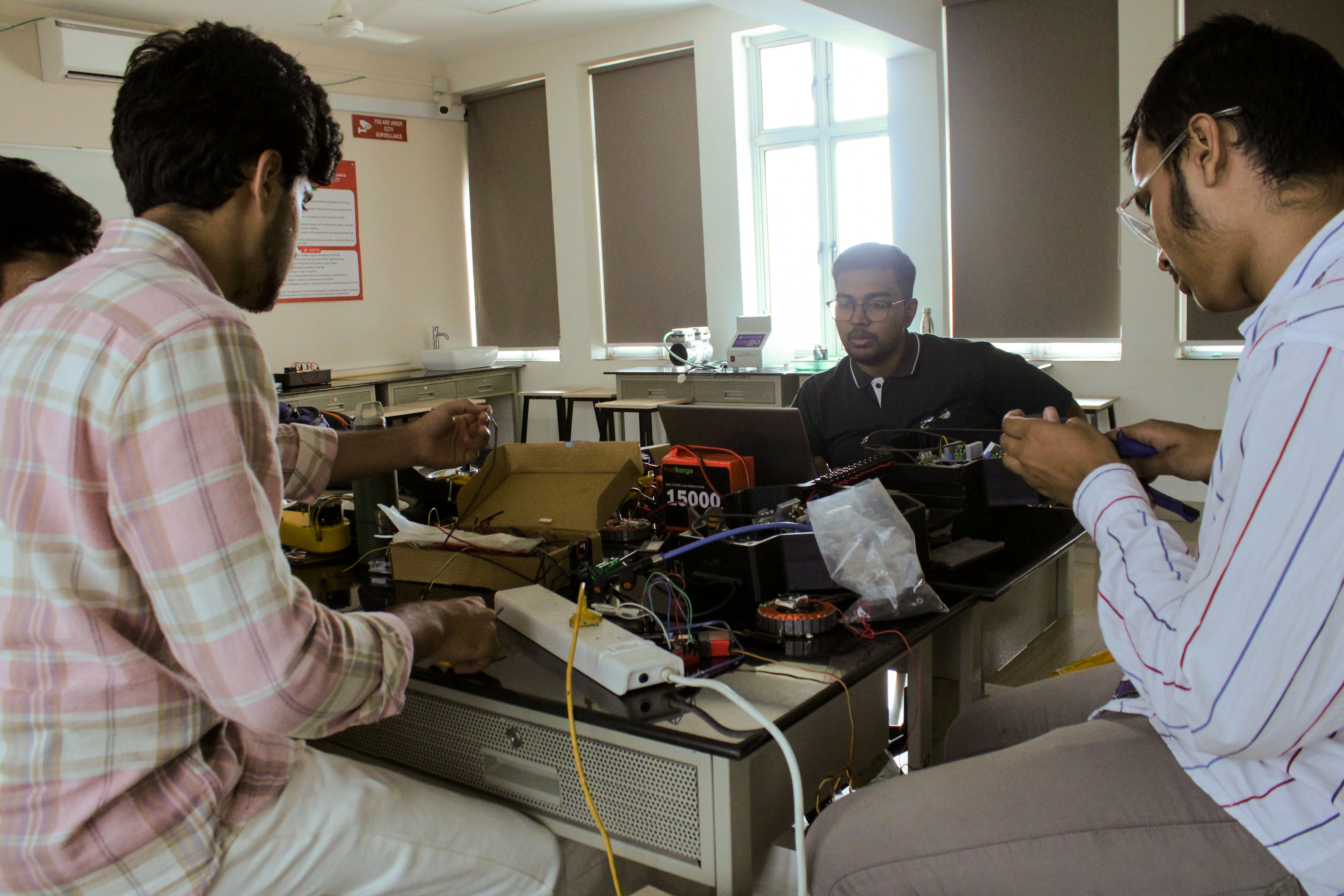 Student team at laboratory assembly workbench